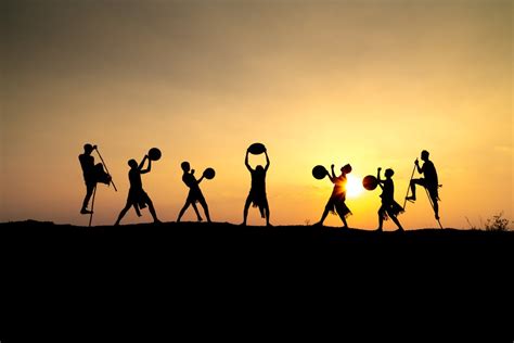 Silhouettes of People Dancing at Sunset · Free Stock Photo