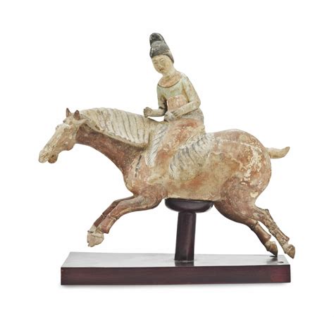 A Chinese Tang Style Painted Pottery Figure Of A Female Equestrian