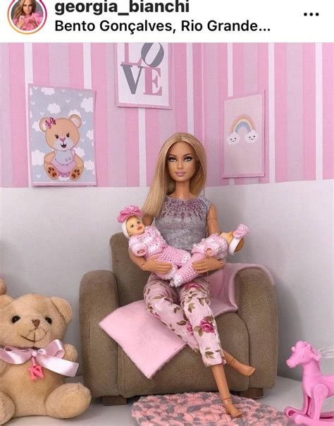 A Barbie Doll Sitting On A Couch With Two Teddy Bears And A Baby In Her