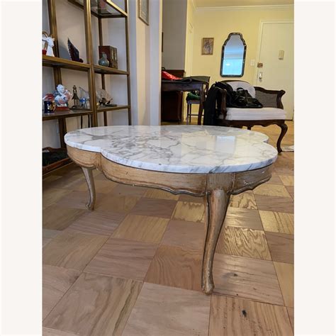 Cloverleaf Coffee Table With A Marble Top AptDeco