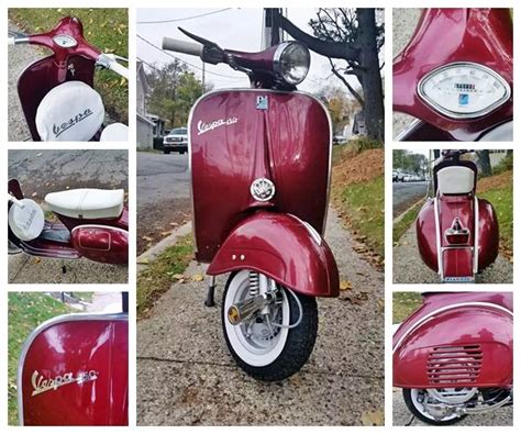 A Red Scooter Parked On The Side Of A Road