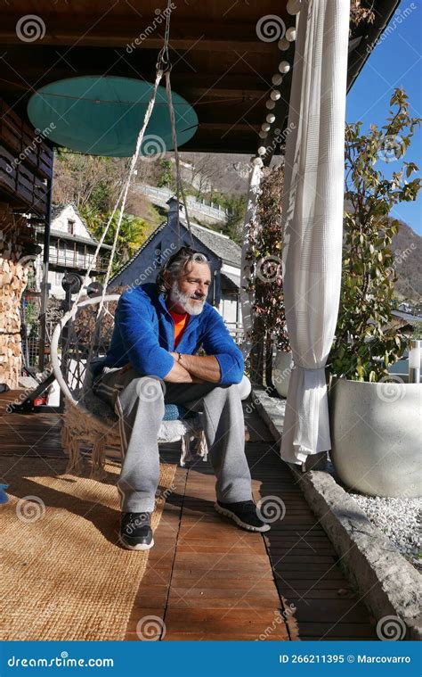 Mature Man Sitting Under The Porch Stock Image Image Of Freedom Rope