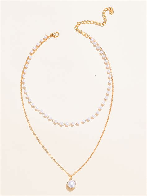 Buy Urbanic Women Gold Toned White Layered Pearl Necklace Necklace