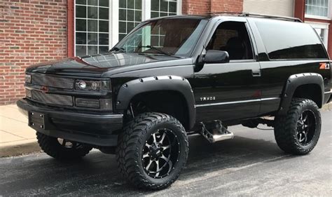 Black Chevy Tahoe with Lifted Suspension