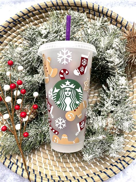 This is a Starbucks Cold Cup decorated with Christmas sweets! This cup ...