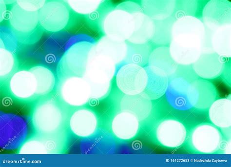 Defocused Abstract Blue And Green Glitter Lights Background Stock Image