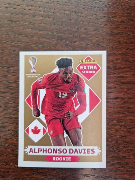 Panini WC Qatar 2022 ALPHONSO DAVIES Extra Sticker Gold Catawiki