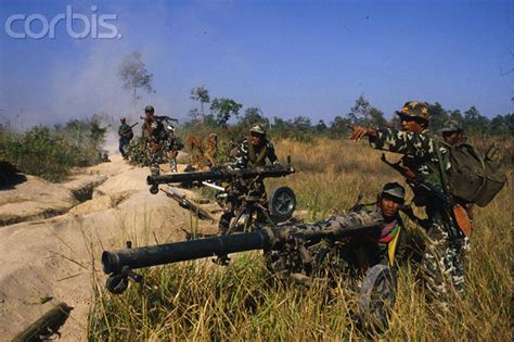 Pro-Vietnamese Cambodian troops fighting against anti-Vietnamese ...