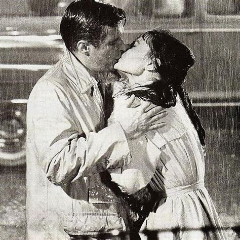 Audrey Hepburn And George Peppard Famous Kissing In The Rain Scene