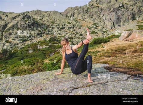 yoga poses woman mountain Stock Photo - Alamy