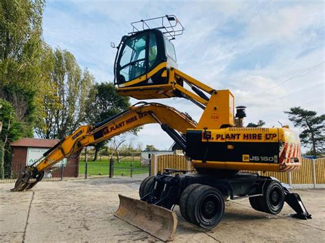 JCB 160W HIGH RISE CABIN WHEELED EXCAVATOR YEAR 2009 C W GRAPPLE GRAB