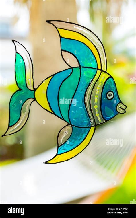 Window painting of fish made by window colors Stock Photo - Alamy