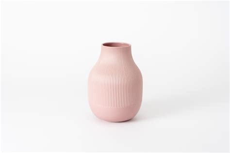 Premium Photo | Pink ceramic vase