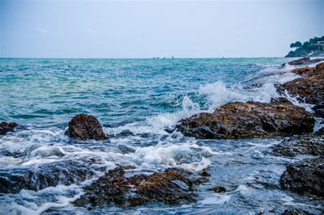 Ocean Waves Breaking on the Rocks on the Shore. Stock Photo - Image of ...