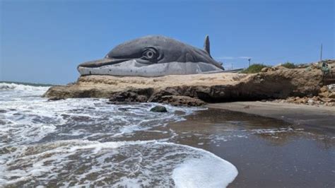 See the Giant Dolphin Sculpture at Dolphin Beach in Data de Posorja ...