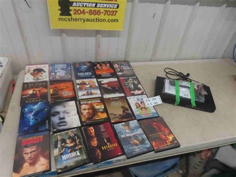 DVD Player + 20 DVD Movies - McSherry Auction Service Ltd.