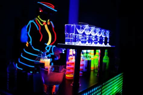 Premium Photo Professional Barman And Led Light Show Silhouette Of