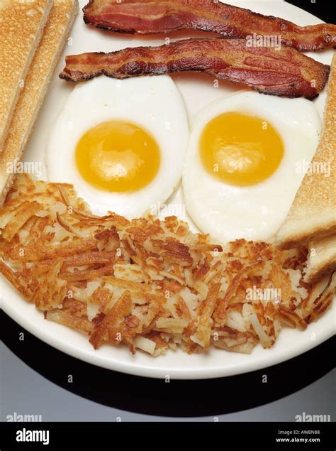 Hearty Breakfast Plate Two Fried Eggs Sunny Side Up Bacon Strips Toast