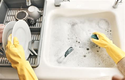 Premium Photo Housewife Maid Or Cleaner Hands Washing Dishes In The Kitchen Sink For Home