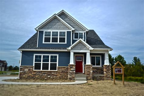 Americana And Beautiful Columns House Exterior Blue Outside House