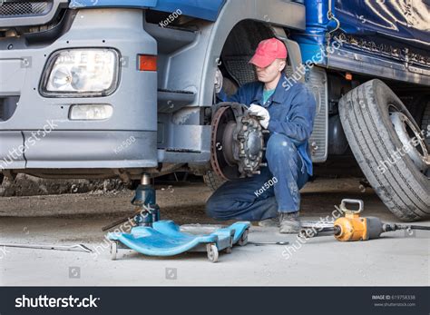 Mechanic Repair Truck On Jack Stock Photo 619758338 Shutterstock