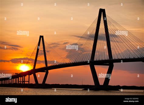 Sunset over the Arthur Ravenel Jr. bridge in Charleston, SC Stock Photo ...