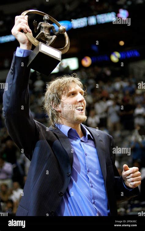 Dallas Mavericks Dirk Nowitzki Of Germany Holds Up The Innagural Fiba