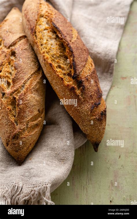 Loaf Of Artisan Bread Top View On Rustic Background Stock Photo Alamy