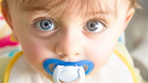 Sucking On Your Babys Pacifier May Have This Surprising Impact On