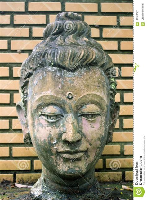 Close Up Years Old Of Ancient Head Stone Buddha Statue At Hi Stock