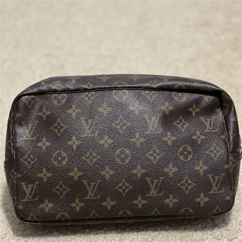 100 Louis Vuitton Toiletries Pouch Used Gem