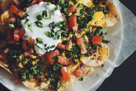 it's the winner of our first unofficial vegan nacho challenge... a classic nachos supreme with ...