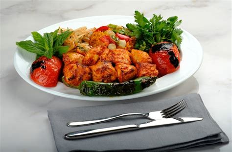 Premium Photo Turkish Kebab Ready To Be Served At The Table Adana