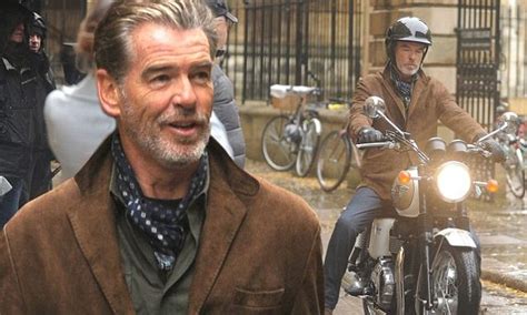 Pierce Brosnan Is No 007 As He Struggles To Ride His Classic Motorbike