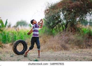 636 Indian kids playing cricket Images, Stock Photos & Vectors ...