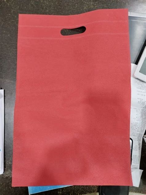 Red Non Woven D Cut Bag At Rs 130 Kg Non Woven D Cut Bag In Rajkot