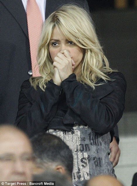 Celeb Photos Shakira Plants A Passionate Congratulatory Kiss On