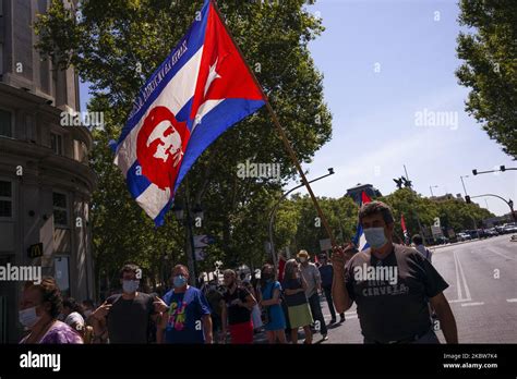 Protesters With Cuban Flags During The Demonstration With The Slogan