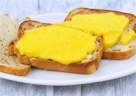 Premium Ai Image Welsh Rarebit Melted Cheese On Toast