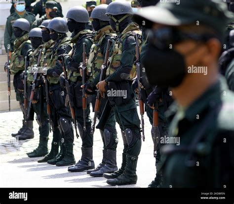 Sri Lankan Army Soldiers Guard The Road Leading To The Main Entrance Of