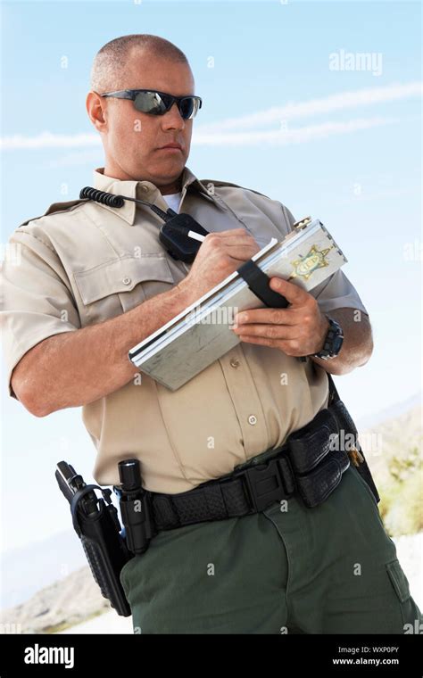 Police Officer Writing A Ticket Stock Photo Alamy