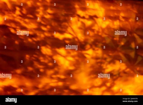 abstract crimson background  dark  light light spots stock photo