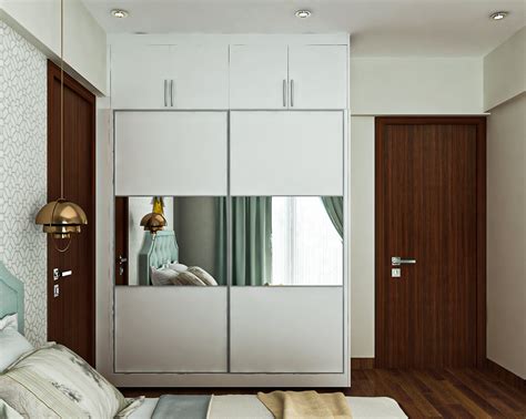 Spacious Sliding Door Wardrobe Design With Mirrors Livspace