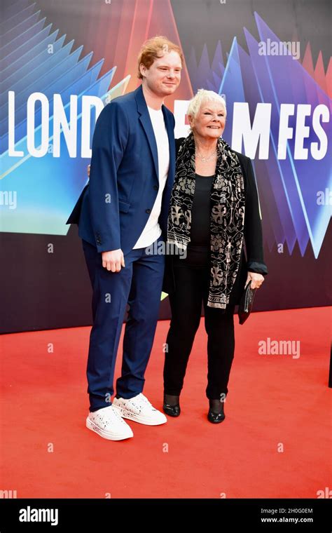 London, UK. Dame Judi Dench with her grandson Sam Williams. Belfast ...