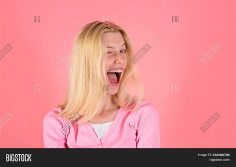 Winking Woman Smiling Image And Photo Free Trial Bigstock