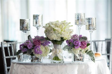 Ivory and Purple Floral Centerpieces