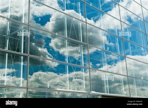 Cloudy Blue Sky Reflected In Office Windows Stock Photo Alamy