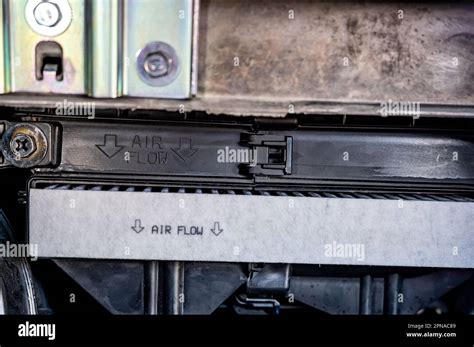 automotive cabin air filter direction  flow arrow marked  casing