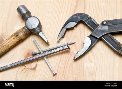 Old Hammer And Screw On Wood Background Stock Photo Alamy