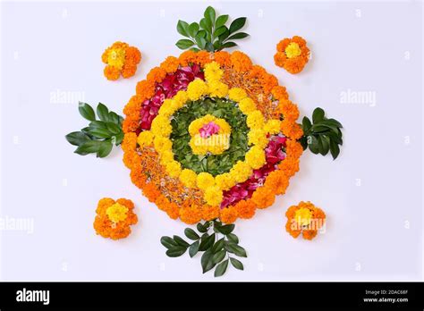 Flower Rangoli For Diwali Or Pongal Or Onam Made Using Marigold Or